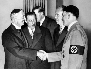 Adolph Hitler chats with Neville Chamberlain