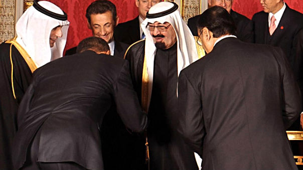 President Barack Obama bowing to then Saudi King Abdullah in 2009