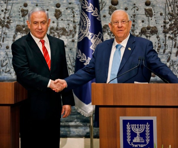 Israeli President Reuven Rivlin (R) tasks Prime Minister Benjamin Netanyahu with forming a new government, during a press conference in Jerusalem on September 25, 2019. (Menahem Kahana/AFP/Getty Images)
